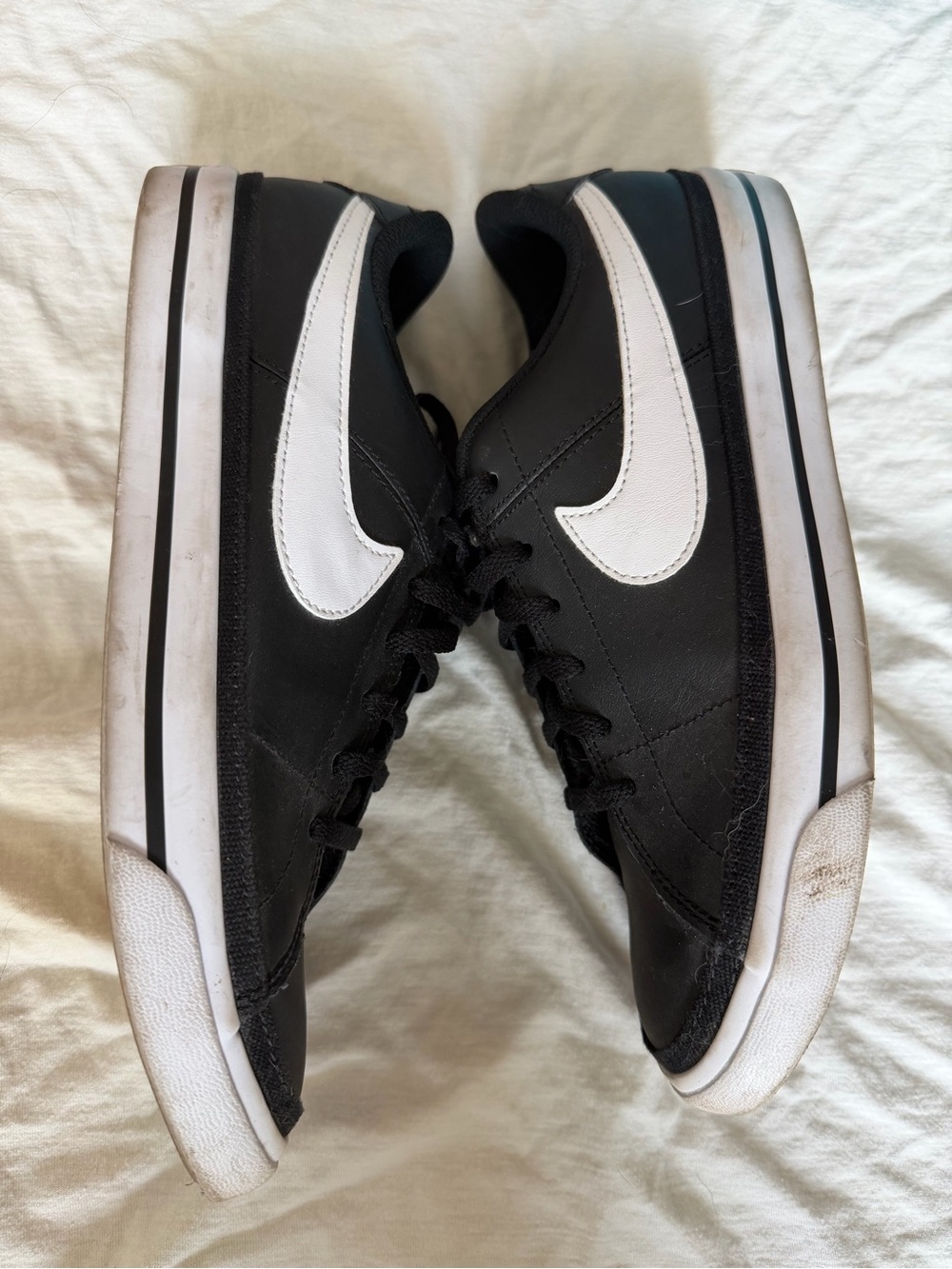 Nike Black Sneakers with White Swoosh Low-Top